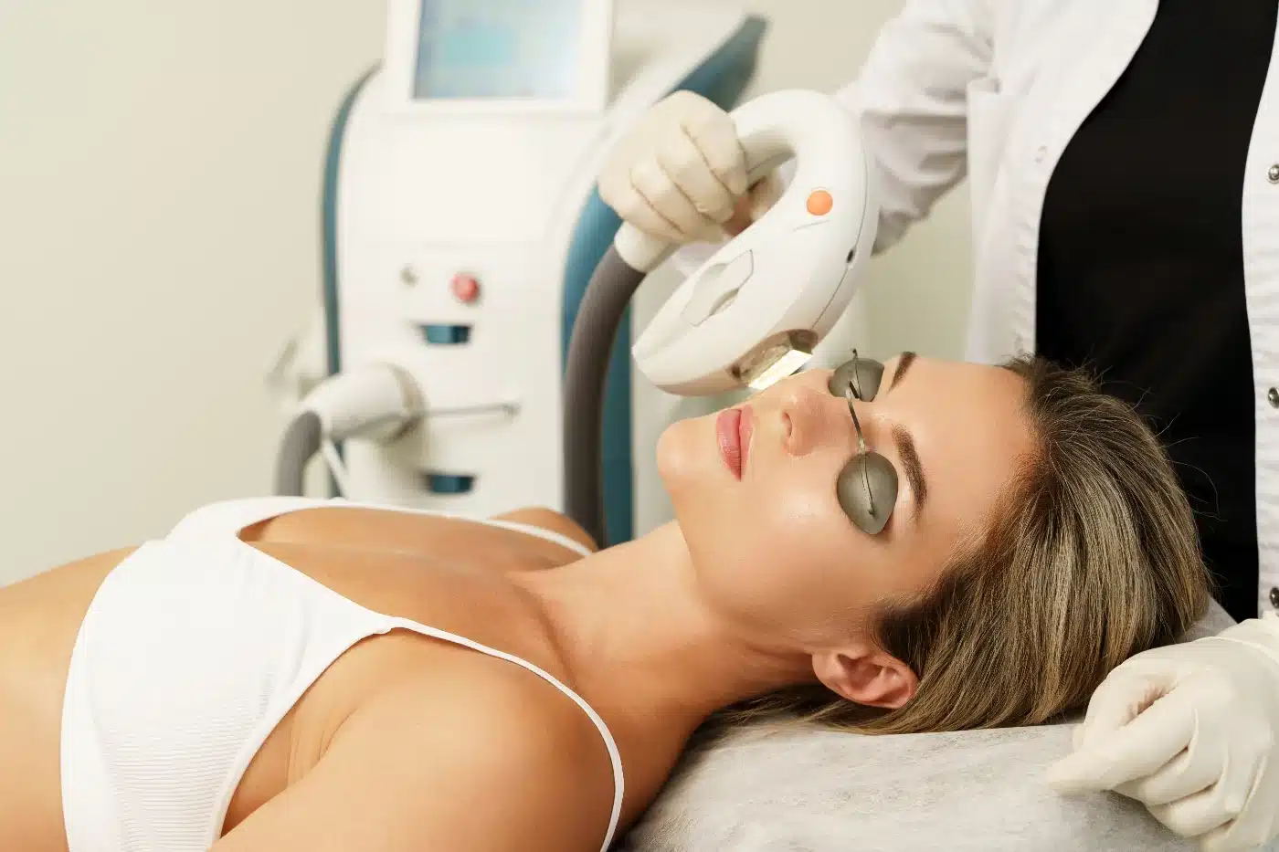 Woman client during IPL treatment in a cosmetology clinic